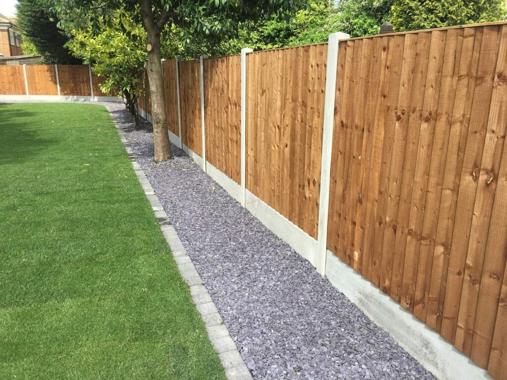 A landscaped garden showing newly installed overlap fence panels