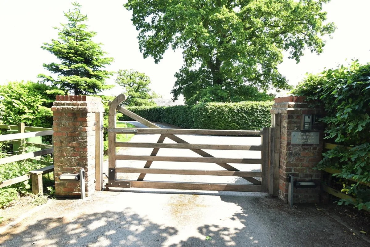 An image showing a wooden gate for driveway.