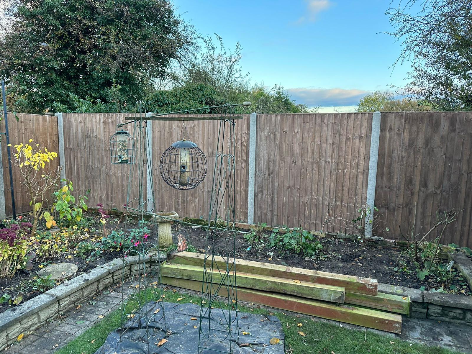 An image showing new Fence Panels and Posts installed in a back garden.